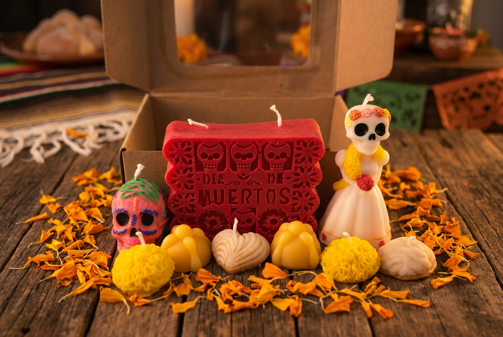 Kraft box Día de los Muertos candle set styled on rustic table with marigold petals